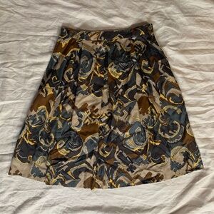 Personal pleated knee-length skirt, yellow, blue, and brown pattern, 100% rayon
